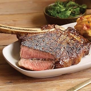 Premium French-cut Bone-in Ribeye Steak, 4 steaks, 16 oz each - Wet Aged for Perfection with Included Cooking Instructions - A Culinary Delight for Every Occasion from Kansas City Steak Company.